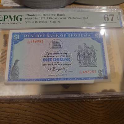 世界钱币～微拍第221期暨2025年第61期  最新货品（群里先挑剩）选购 - 1979年罗德西亚1元 PMG67E尾号952