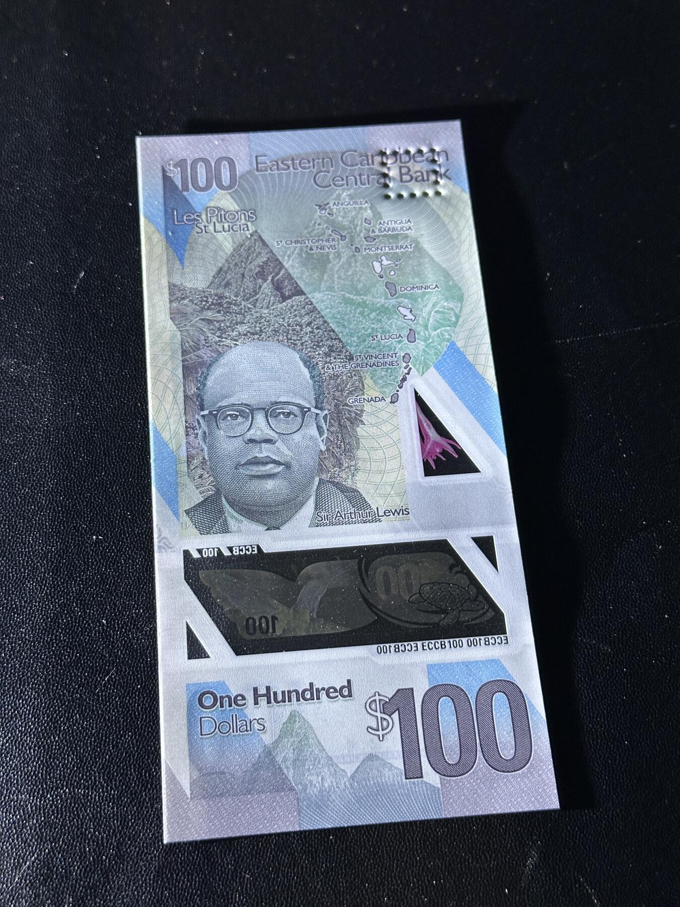 《外钞收藏家》第五百九十七期（年底收官场）（本平台长期征集拍品、欢迎藏友们联系合作） 2019年东加勒比100元 全新UNC