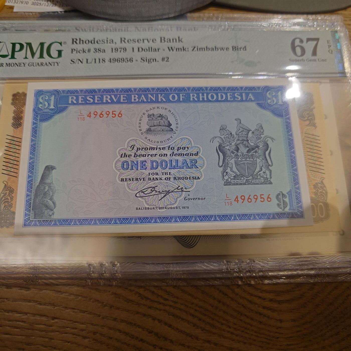 世界钱币～微拍第221期暨2025年第61期  最新货品（群里先挑剩）选购 1979年罗德西亚1元 PMG67E尾号956