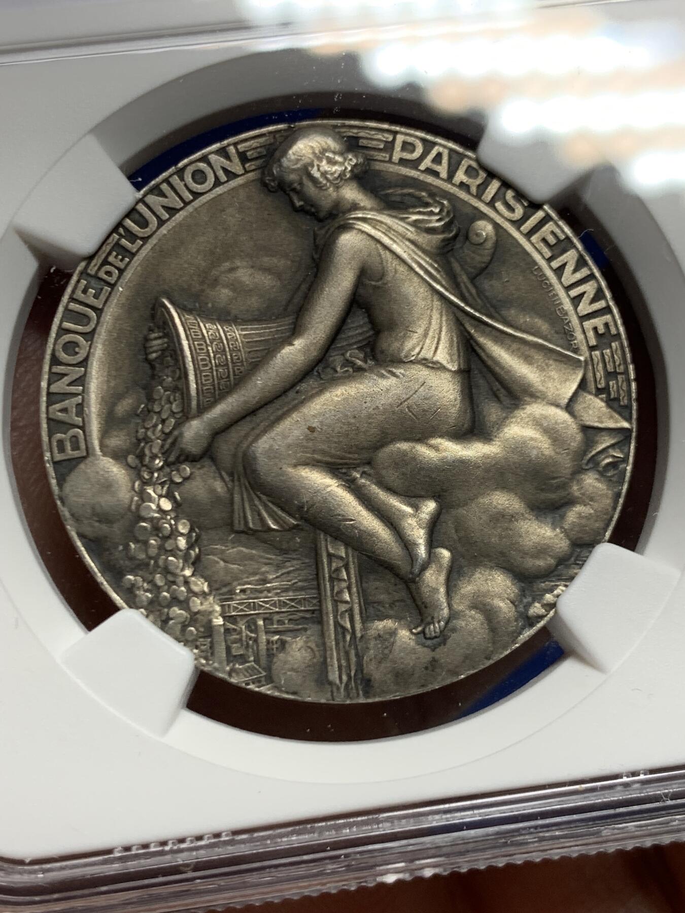 《竞宝斋》第451场 周日，周一，周二  3场连拍 （全场包邮，欢迎送拍） NGC MS62 法国巴黎联合银行银质代币，财富女神手持丰饶角，由巴黎造币厂总雕刻师吕西安·巴佐尔雕刻而成