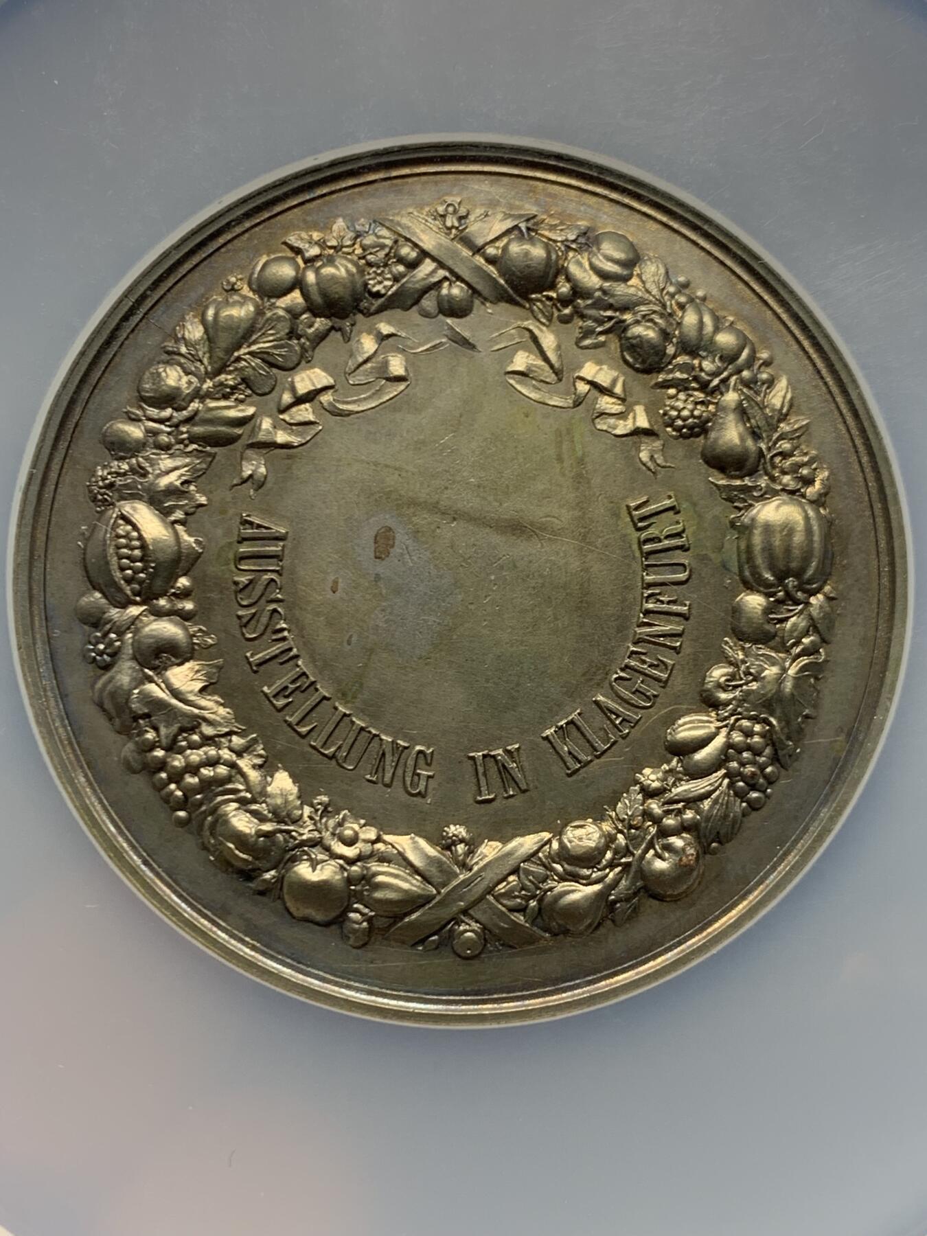 《竞宝斋》第451场 周日，周一，周二  3场连拍 （全场包邮，欢迎送拍） NGC MS63 奥地利克拉根福博览会镀银铜章，盒子加大加厚