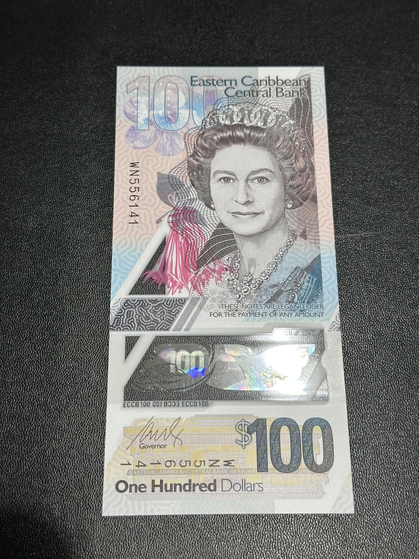 《外钞收藏家》第五百九十七期（年底收官场）（本平台长期征集拍品、欢迎藏友们联系合作） 2019年东加勒比100元 全新UNC