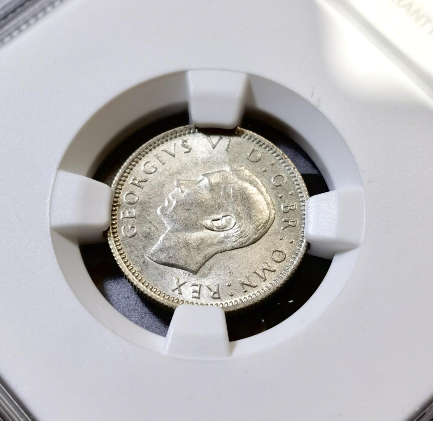 甄臻铺-世界币章拍卖（第45期）精品场拍品征集中，送拍享返佣金等优惠多多 NGC-MS63 英国1946乔治六世六便士银币，经典爱情幸运币，BU状态品相好