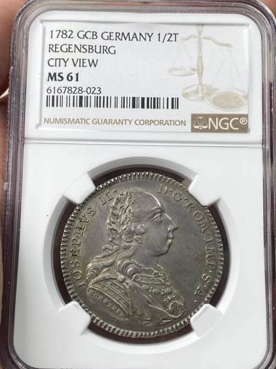 万国钱币拍卖第058期（万国新年大拍） - NGC MS61 1782年德国雷根斯堡自由市景观1/2泰勒  后期版头像 全深打景观极其难得 高点细节极佳 原味欧陆包浆收藏级