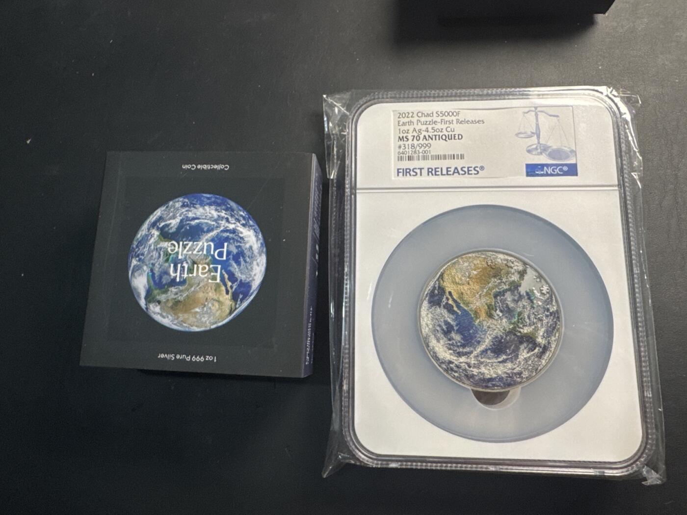 ❤️【币观天下】❤️ 第336期钱币拍卖- 2025.12.26周五晚上6点半场-长期征集拍品 乍得2022年美丽家园彩色地球拼图银铜双金属纪念银币 NGC MS70