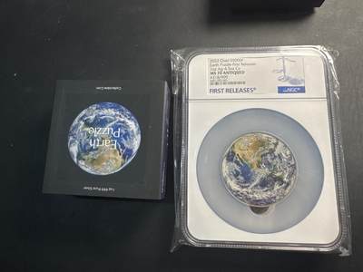 ❤️【币观天下】❤️ 第336期钱币拍卖- 2025.12.26周五晚上6点半场-长期征集拍品 - 乍得2022年美丽家园彩色地球拼图银铜双金属纪念银币 NGC MS70