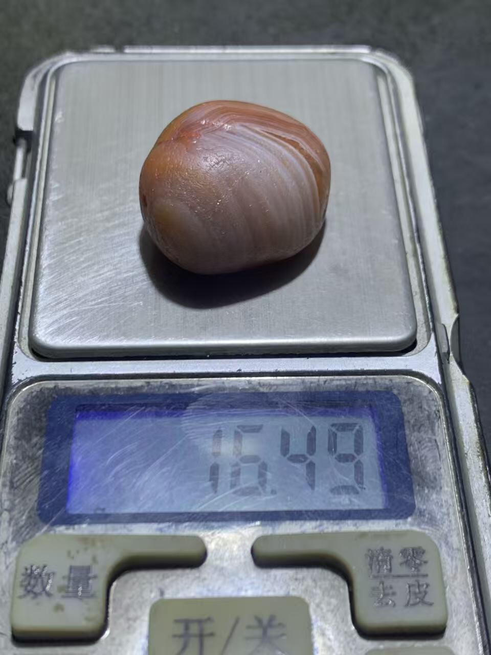 精美红白天眼千层纹水冲籽川料南红玛瑙原石一颗