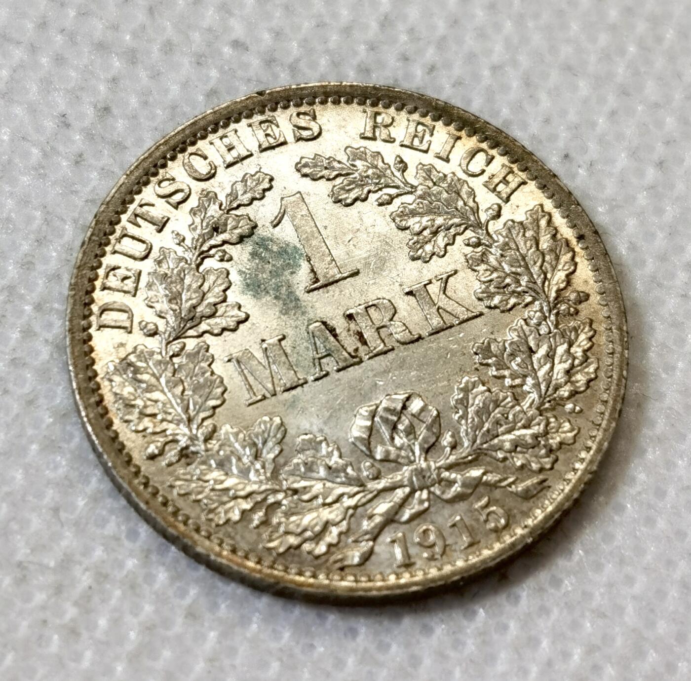 甄臻铺-世界币章拍卖（第45期）精品场拍品征集中，送拍享返佣金等优惠多多 UNC 德国1915年长翅鹰1马克银币 车轮转光 羽毛清晰，细节见图