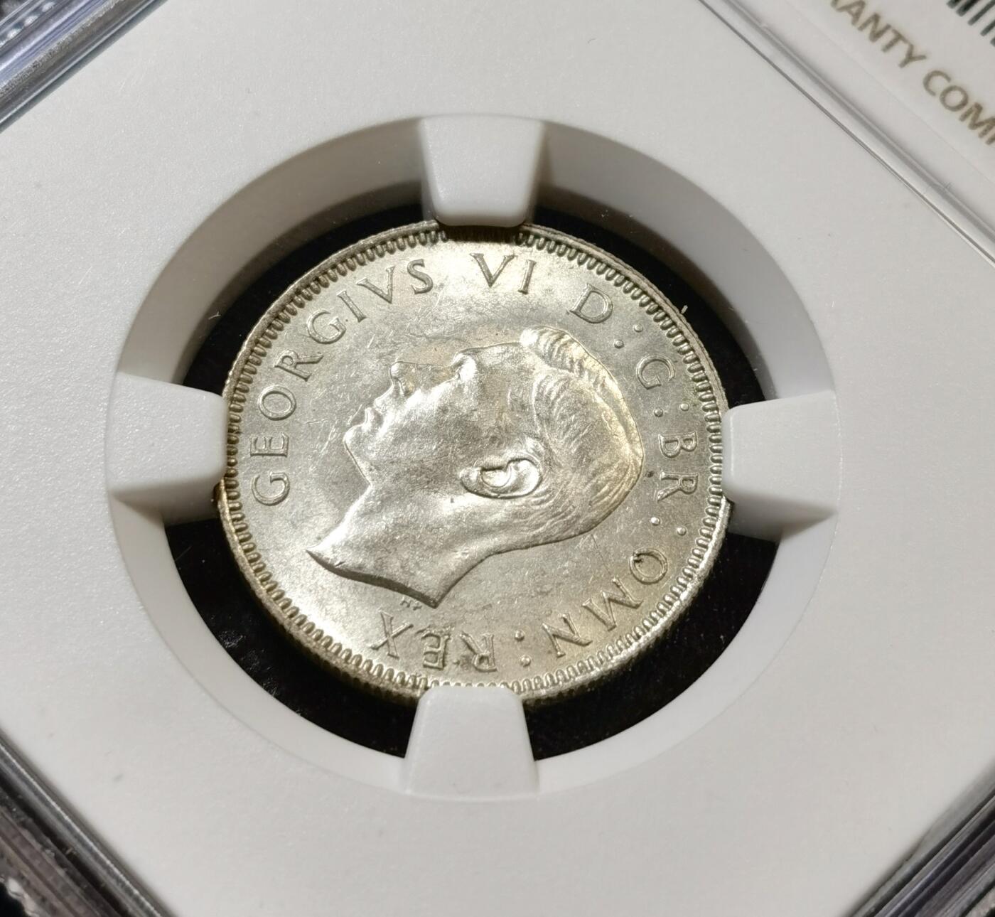 甄臻铺-世界币章拍卖（第45期）精品场拍品征集中，送拍享返佣金等优惠多多 NGC-MS62 英国1941乔治六世先令银币，英格兰版，UNC状态好