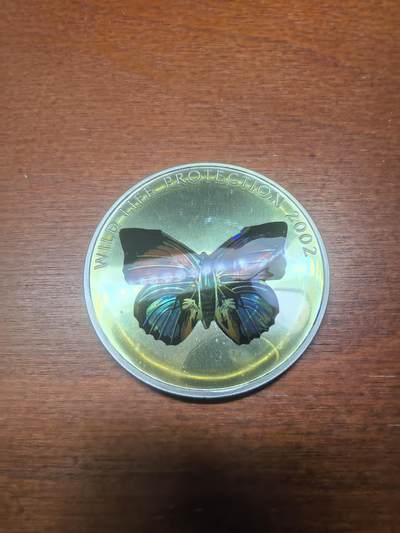 长老汇蛇年精选第八十七场拍卖 - 2002刚果非洲珍稀蝴蝶之多彩黑蝴蝶10法郎全息幻彩精制银币，25.95克925银，1.5万枚，克书65美金
