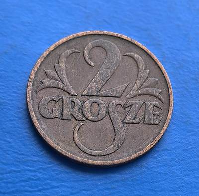 外国优质老铜币高银银币，周六九点倒数截拍，满百包邮，持续收拍 - 波兰 1936 年2 格罗申铜币，铸于二战爆发前的第二共和国时期。正面波兰鹰徽（王冠加持，民族象征），背面面额设计简洁。铜币包浆凝岁月，见证战前东欧政治脉动。作为二战前夜的货币标本，承载波兰共和记忆，适配欧洲币藏与二战史爱好者