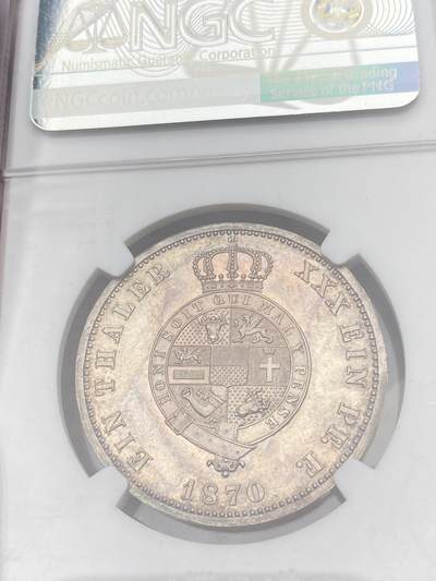 万国钱币拍卖第058期（万国新年大拍） NGC PF64 1870年德国梅克伦堡-施特雷利茨精制泰勒 罕见小邦精制品种 极具特色的纹章设计 原味入骨香槟色五彩环绕 顶级收藏品质