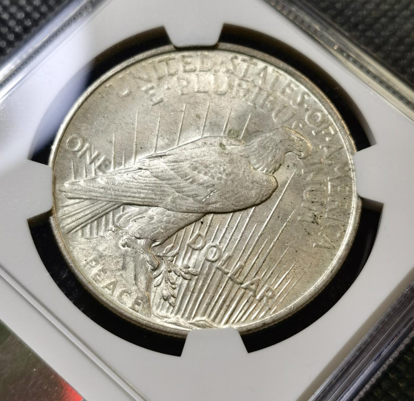 甄臻铺-世界币章拍卖（第45期）精品场拍品征集中，送拍享返佣金等优惠多多 NGC-MS64 美国1922年和平一元银币，双面淡黄油包浆，原光好品