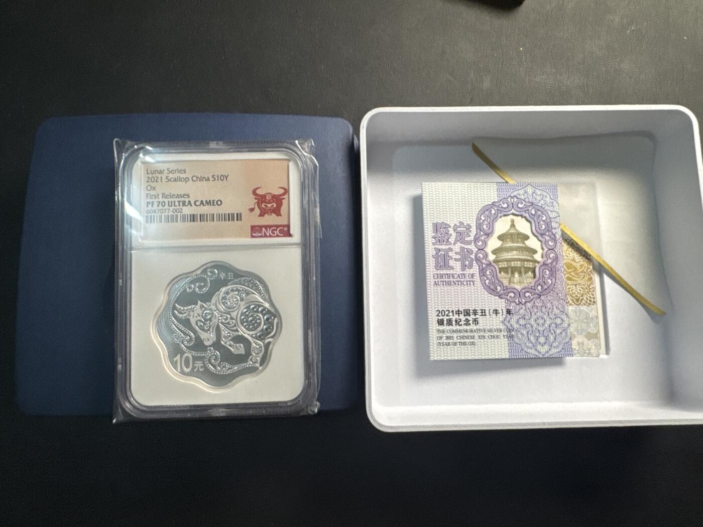 ❤️【币观天下】❤️ 第336期钱币拍卖- 2025.12.26周五晚上6点半场-长期征集拍品 中国2021年牛年梅花形10元生肖银币盒证齐全