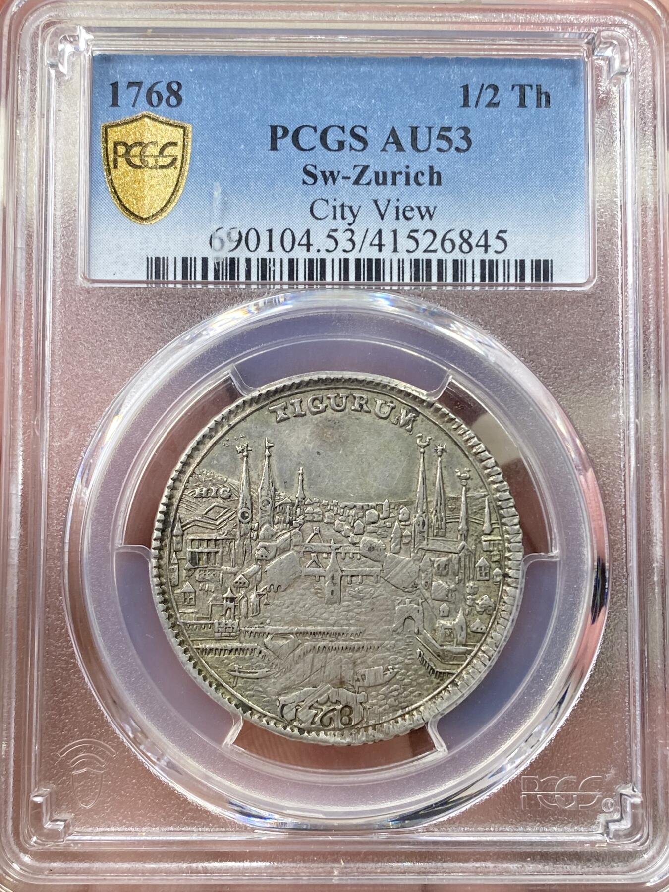 万国钱币拍卖第058期（万国新年大拍） PCGS AU53 1768年瑞士联邦苏黎世城市景观1/2泰勒 瑞士景观泰勒名品之一 苏黎世城市象征雄狮持剑威武 原味好状态