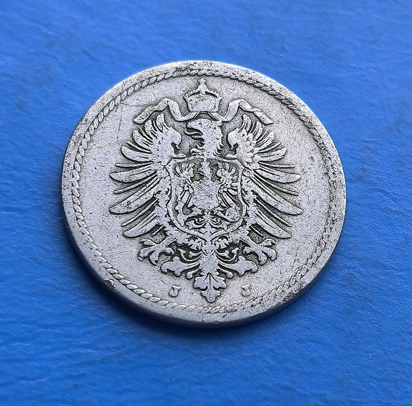 外国优质老铜币高银银币，周六九点倒数截拍，满百包邮，持续收拍 德意志帝国1876 年 5 芬尼J版，铸于统一后第五年，见证帝国初创里程碑。正面帝国鹰徽（双翅展威严，皇冠彰皇权），背面简洁标额，银质包浆凝百年岁月。承载德国从分裂到统一的货币记忆，早期币制实物，工艺与历史交融 。
