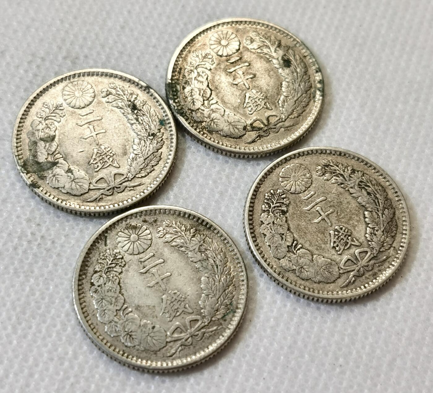 甄臻铺-世界币章拍卖（第45期）精品场拍品征集中，送拍享返佣金等优惠多多 日本明治龙20钱4枚 多年份 21.4克 含银80% 纯银价260