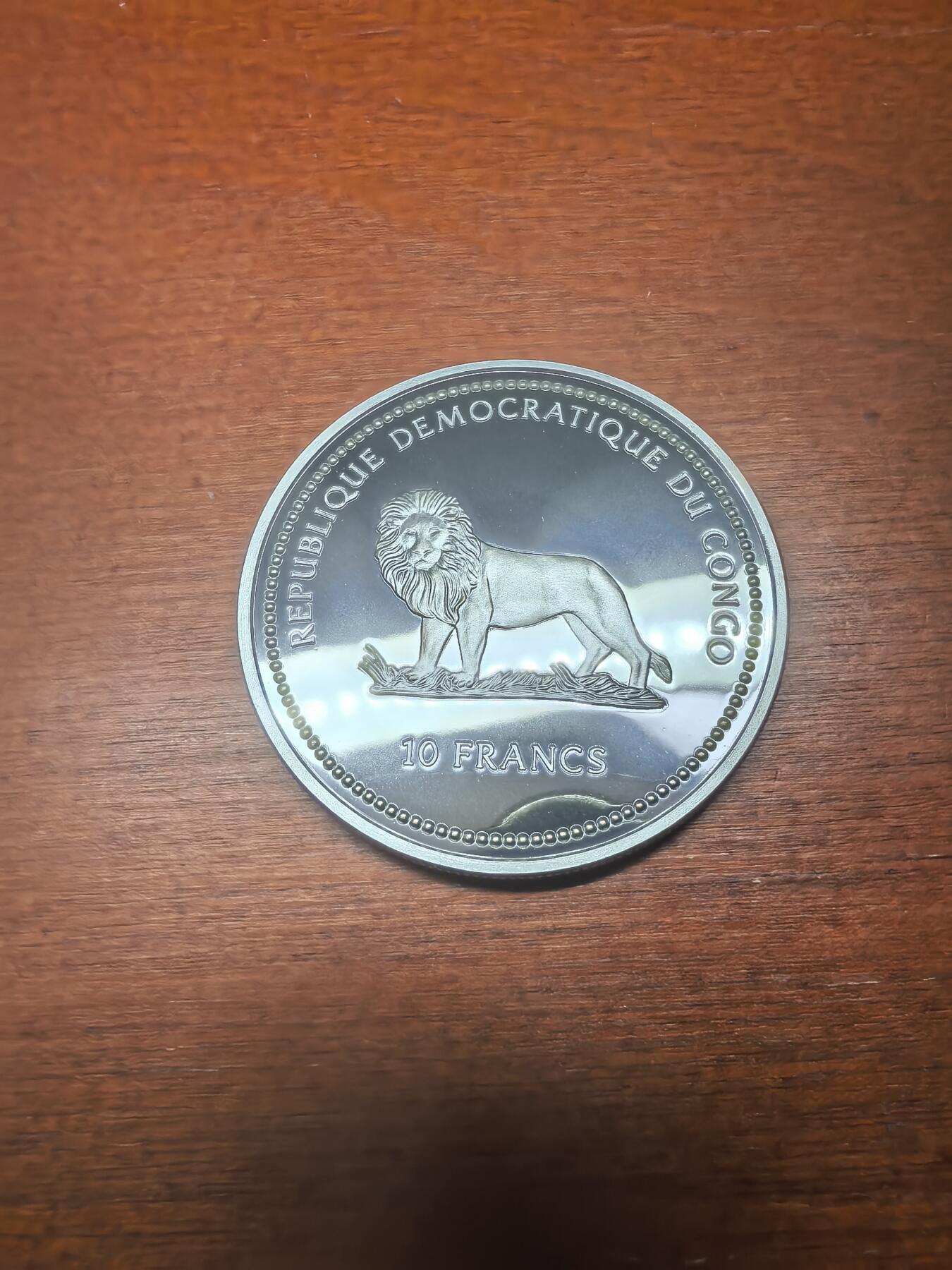 长老汇蛇年精选第八十七场拍卖 2002刚果非洲珍稀蝴蝶之多彩黑蝴蝶10法郎全息幻彩精制银币，25.95克925银，1.5万枚，克书65美金