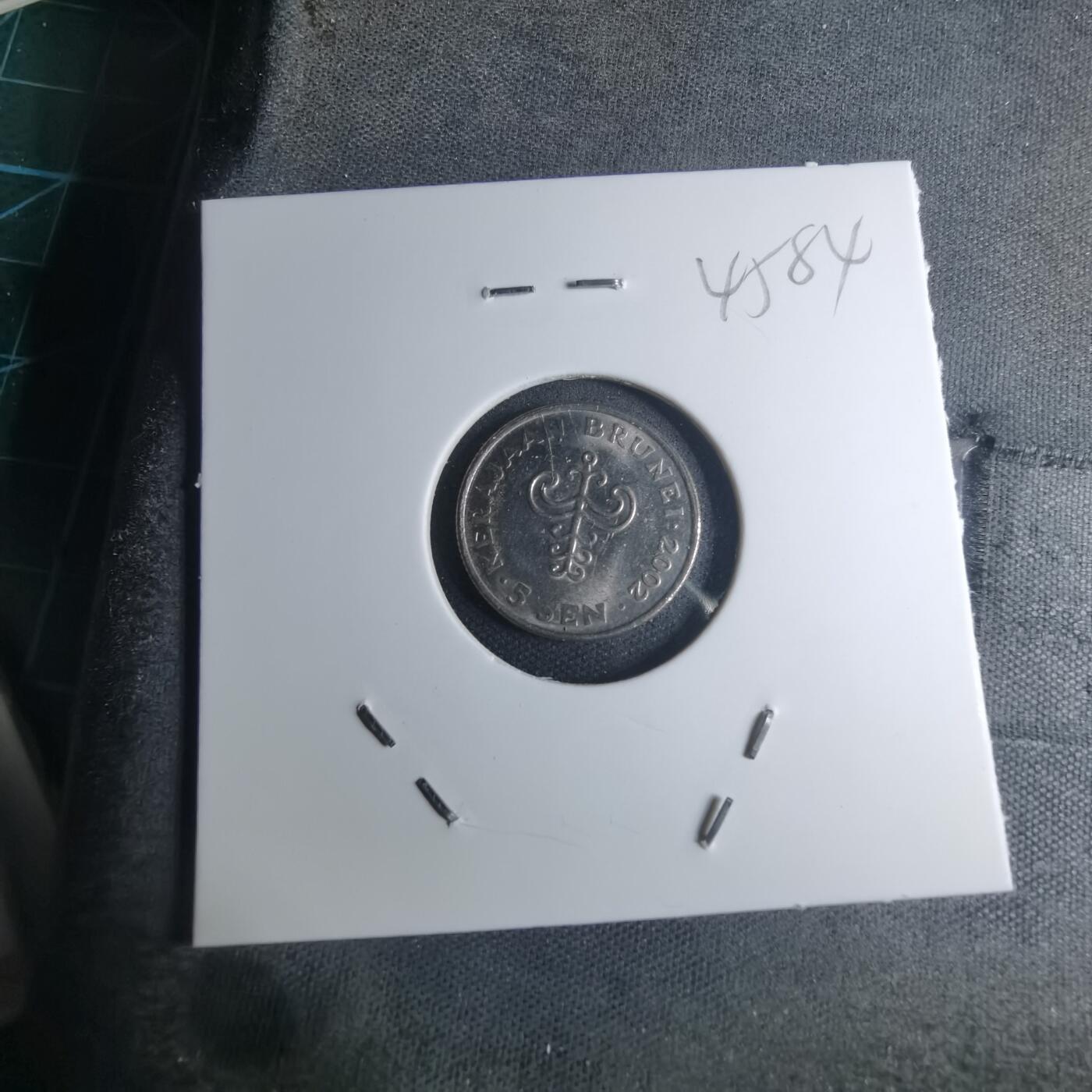 沼泽如烟--第945场 文莱2002年五分