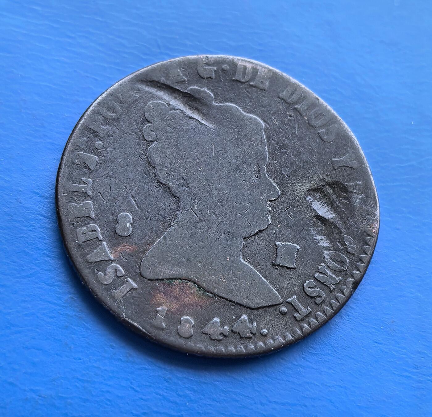 外国优质老铜币高银银币，周六九点倒数截拍，满百包邮，持续收拍 西班牙伊莎贝拉二世1844 年8M老铜币，见证波旁王朝复辟时期。正面女王像、背面纹章（城堡与狮子），凝萃王室符号与传统工艺。百年包浆显岁月痕迹.