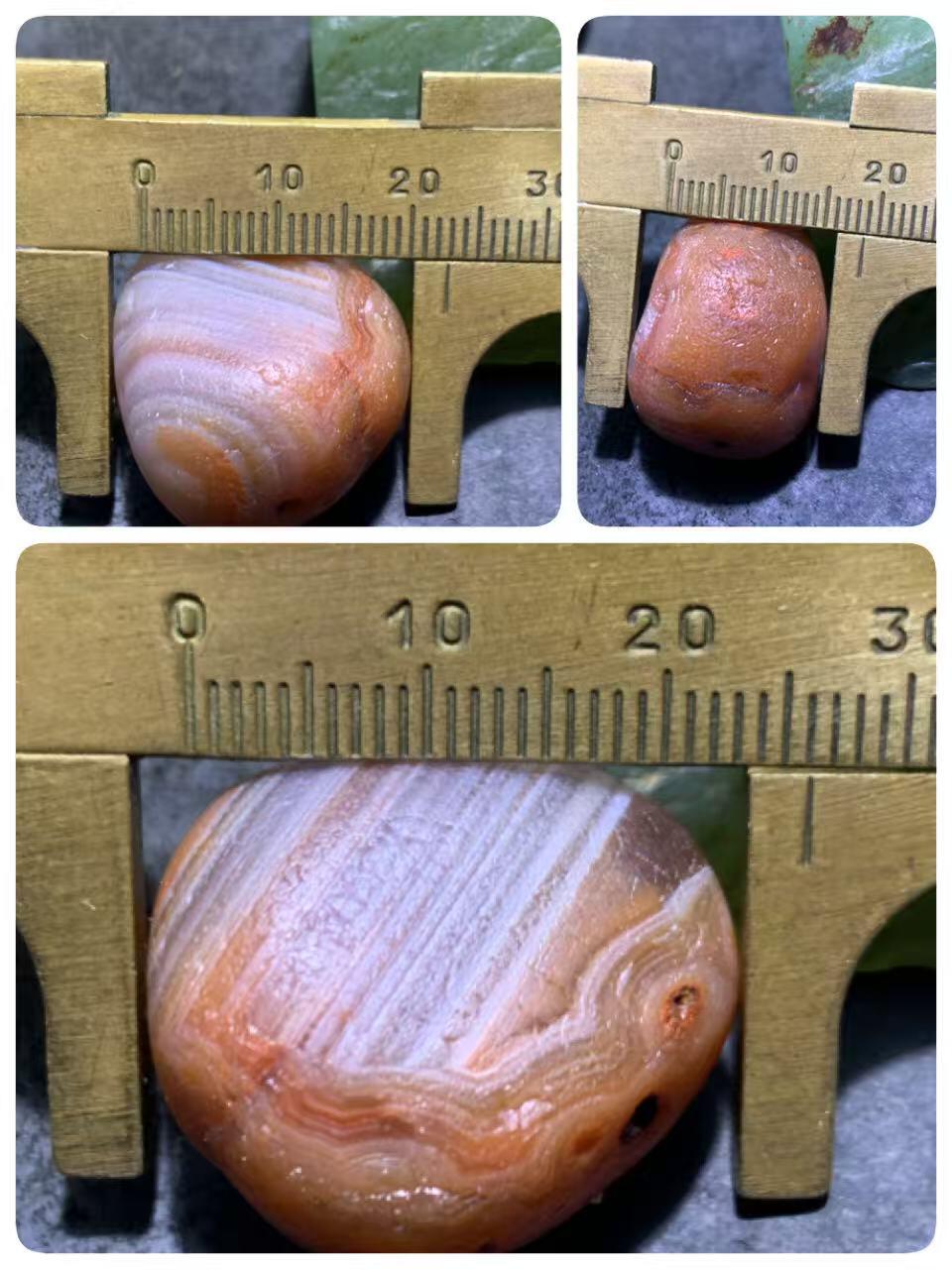 精美红白天眼千层纹水冲籽川料南红玛瑙原石一颗