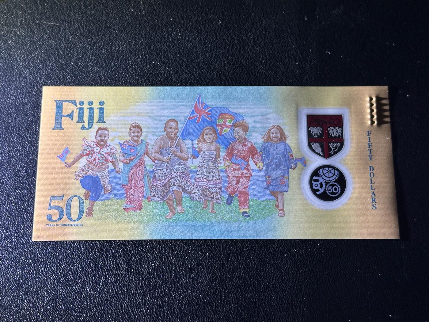 《外钞收藏家》第五百九十七期（年底收官场）（本平台长期征集拍品、欢迎藏友们联系合作） 2020年斐济50元 独立50周年纪念钞 首发冠 全新UNC