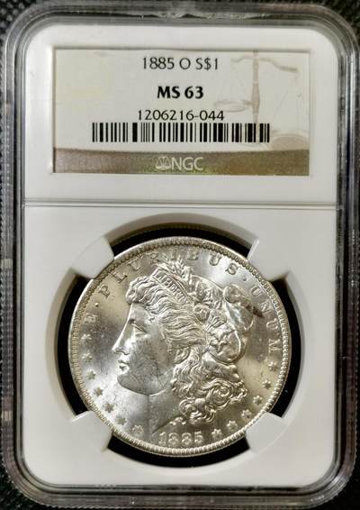 甄臻铺-世界币章拍卖（第45期）精品场拍品征集中，送拍享返佣金等优惠多多 - NGC-MS63 美国1885年O版摩根银元，老盒严评，底板干净，转光强烈