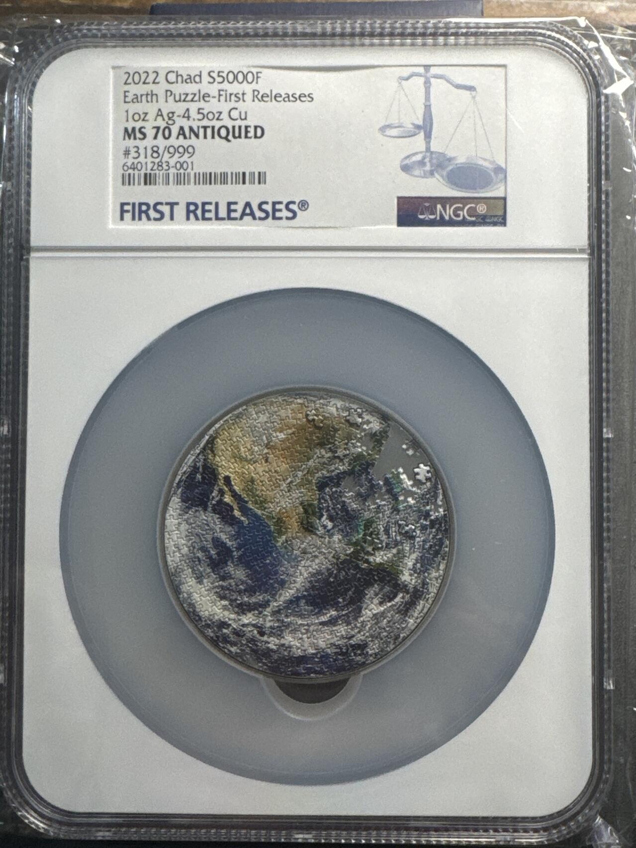 ❤️【币观天下】❤️ 第336期钱币拍卖- 2025.12.26周五晚上6点半场-长期征集拍品 乍得2022年美丽家园彩色地球拼图银铜双金属纪念银币 NGC MS70