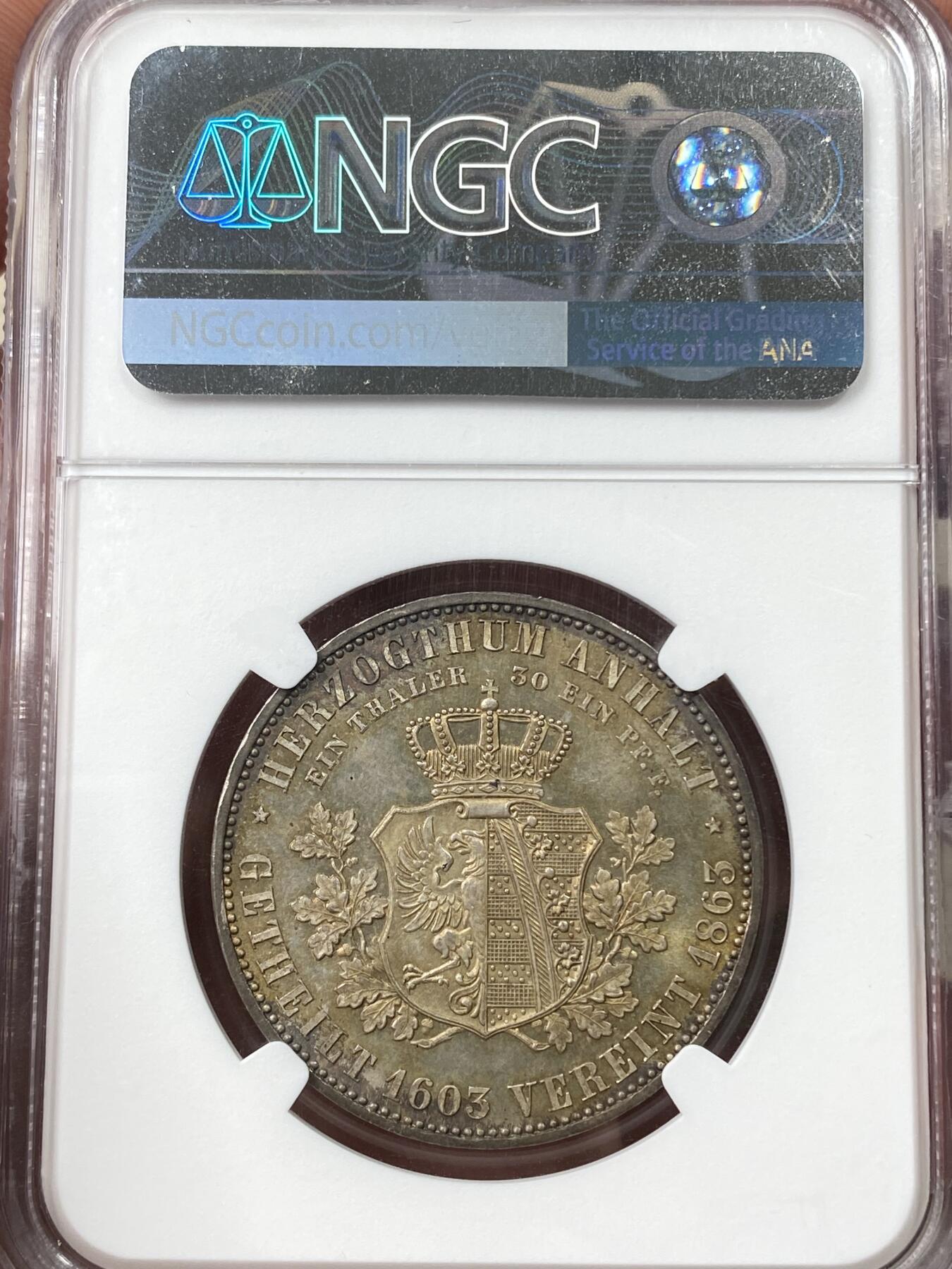 万国钱币拍卖第058期（万国新年大拍） NGC MS66 1863年德国安哈尔特-德邵建国260周年纪念泰勒 欧陆七色祥云幻彩 无可比拟的状态 完全未动过的顶级典藏品质 NGC亚军分（盒子有缺）