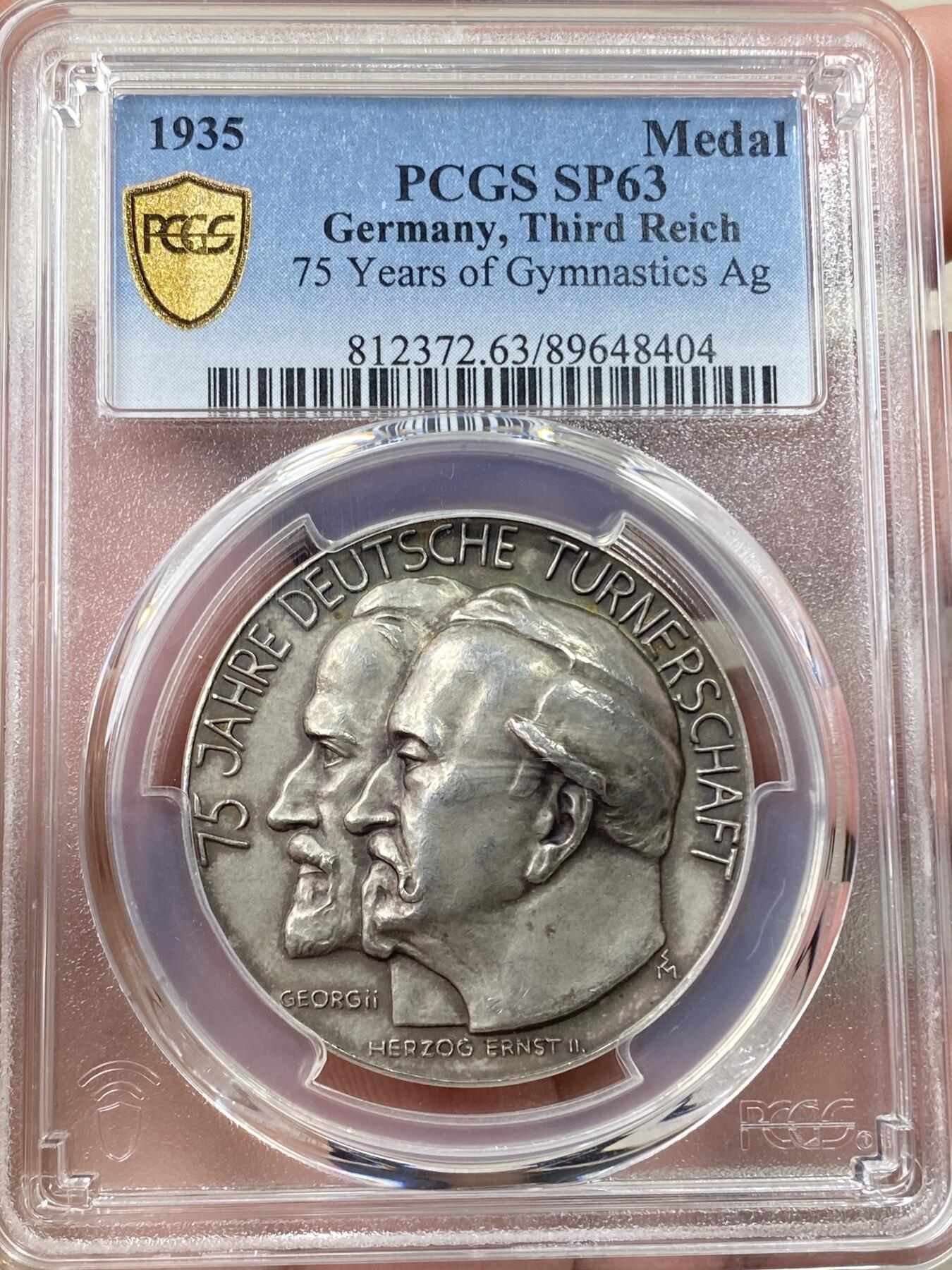 万国钱币拍卖第058期（万国新年大拍） PCGS SP63 1935年德国体操队在科堡成立75周年纪念大银章 西奥多·格奥尔基和恩斯特二世公爵高浮雕头像配万字符 顶级状态天鹅绒淡彩（原图请私信后台或自行查询官网）