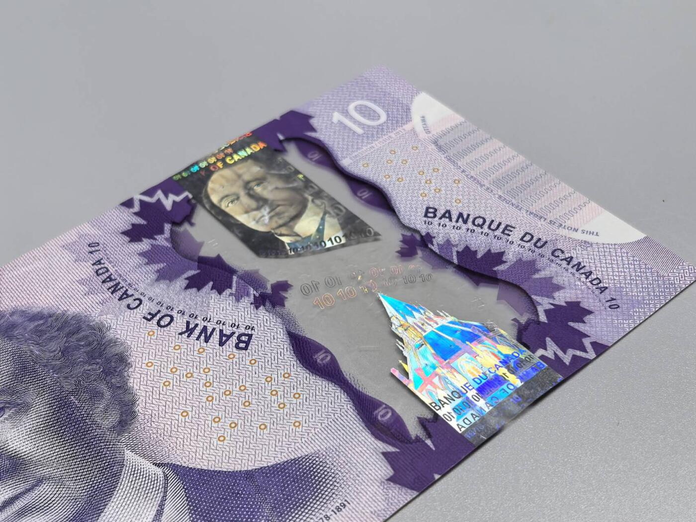 小驴勋章奖章收藏12月27日周六晚六点拍卖（珍爱和平，收藏战争，铭记历史，勿忘国耻，忠党爱国。有偿代拍，送拍规则在简介最后，参拍须阅读规则后再参拍，关系到运费包装发货时效真假辨别等关键信息，拍卖时不再发原图，看大图店主微信码在拍卖店铺介绍里） 加拿大塑料钞10元