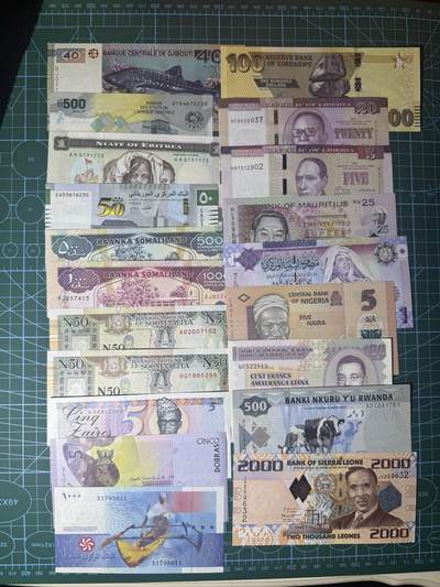 【炜奕收藏】，第五十四期，本场佣金已改，请大家注意 - 非洲杂钞共20张，大部分为全新UNC品相纸币，少部分为非全新或者存在压痕潮斑等轻微瑕疵现象