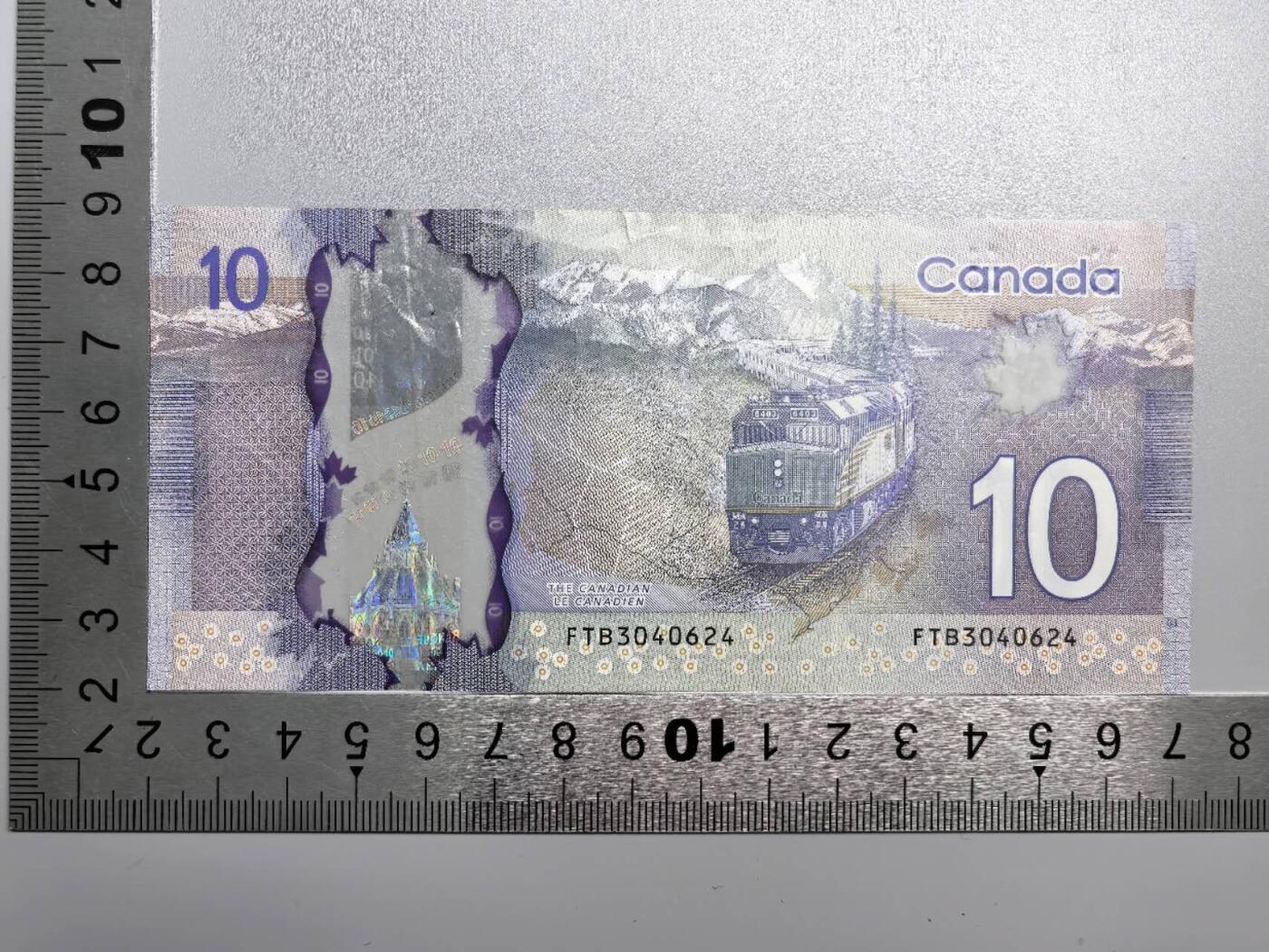 小驴勋章奖章收藏12月27日周六晚六点拍卖（珍爱和平，收藏战争，铭记历史，勿忘国耻，忠党爱国。有偿代拍，送拍规则在简介最后，参拍须阅读规则后再参拍，关系到运费包装发货时效真假辨别等关键信息，拍卖时不再发原图，看大图店主微信码在拍卖店铺介绍里） 加拿大塑料钞10元