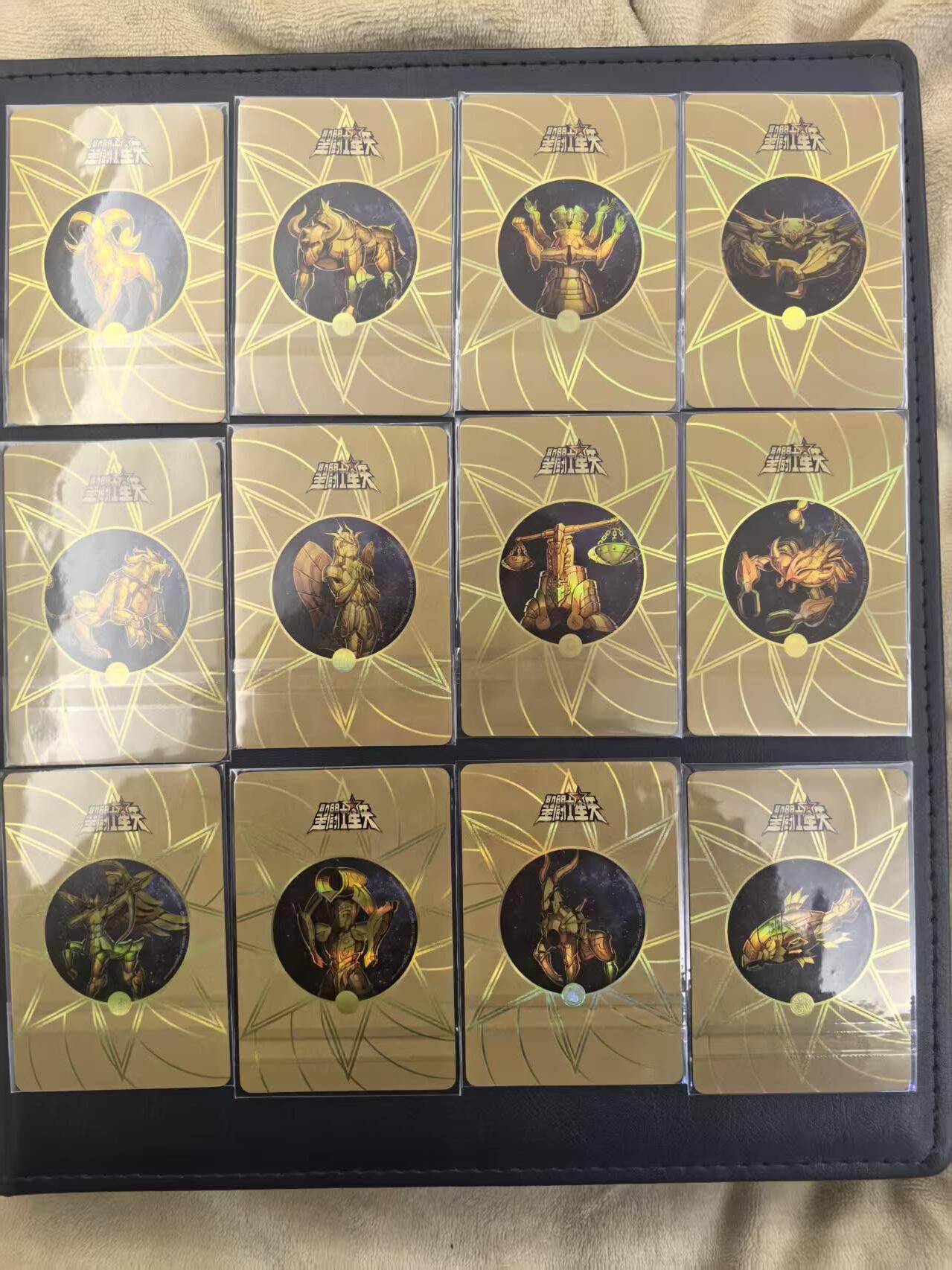 龙虎卡牌-六九场（无佣金，周六结拍，欢迎送拍） 彩闪小卡12张全 圣斗士星矢30周年展览卡 黄金圣斗士一套（卡背圣衣，有压痕，介意勿拍）