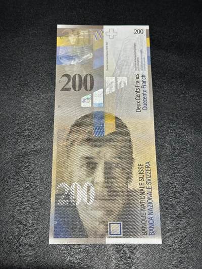 《外钞收藏家》第五百九十七期（年底收官场）（本平台长期征集拍品、欢迎藏友们联系合作） - 2013年瑞士人像竖版200法郎 全新UNC 无47靓号