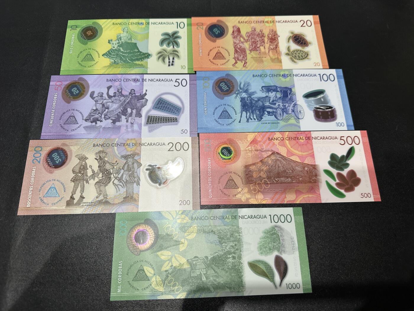 《外钞收藏家》第五百九十七期（年底收官场）（本平台长期征集拍品、欢迎藏友们联系合作） 尼加拉瓜10-1000面额 7张一起 全新UNC 全部是A冠 靓号