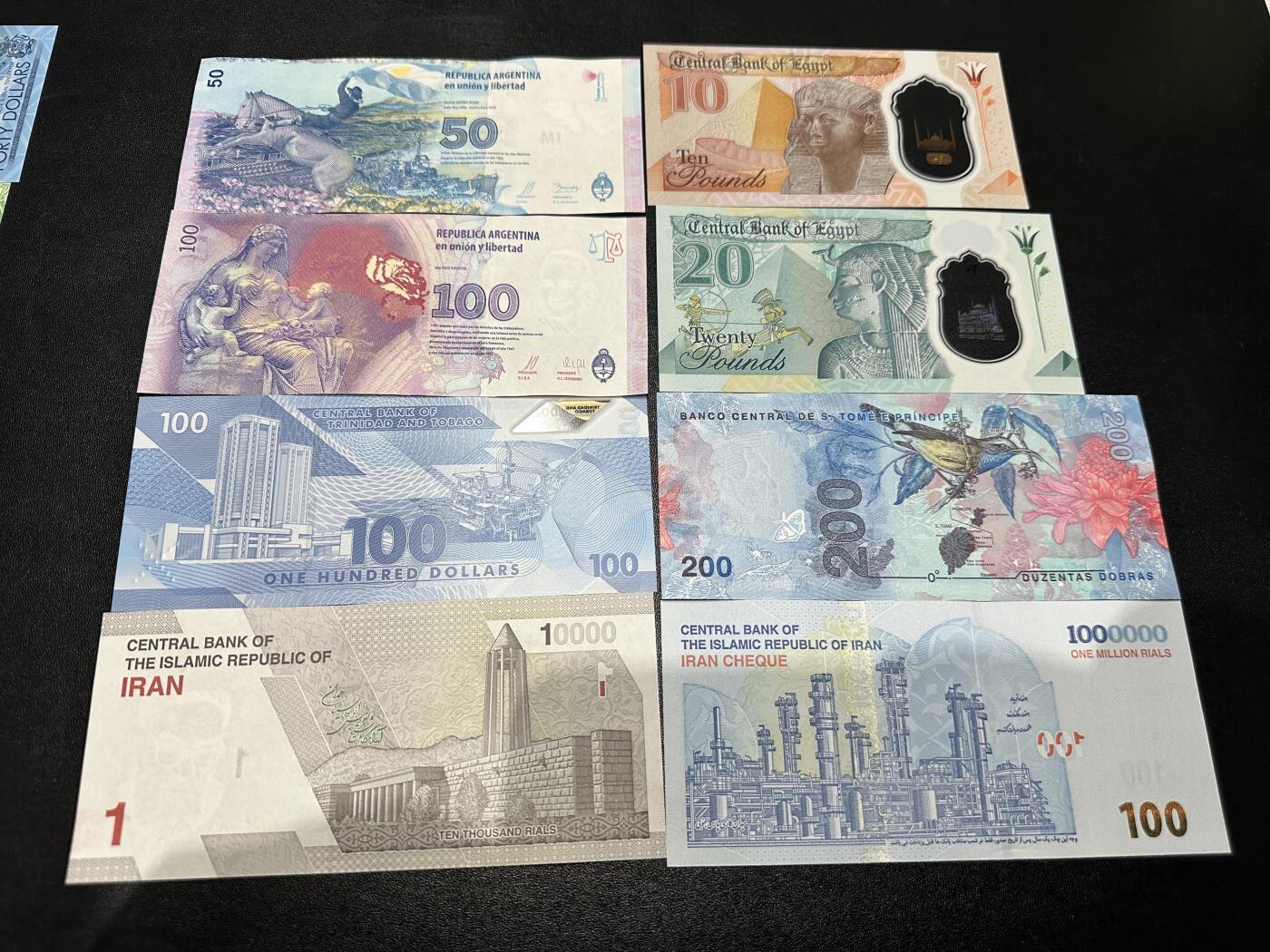 《外钞收藏家》第五百九十七期（年底收官场）（本平台长期征集拍品、欢迎藏友们联系合作） 阿根廷、埃及、特里达尼亚和多巴哥、圣多美和普林西比、伊朗 8张一起 全新UNC