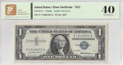 2025十二月第五期，总210期 - 美国1957年版银币券1元TQG40分，由于正面挤纸失误造成了一种有趣的露白错版品种