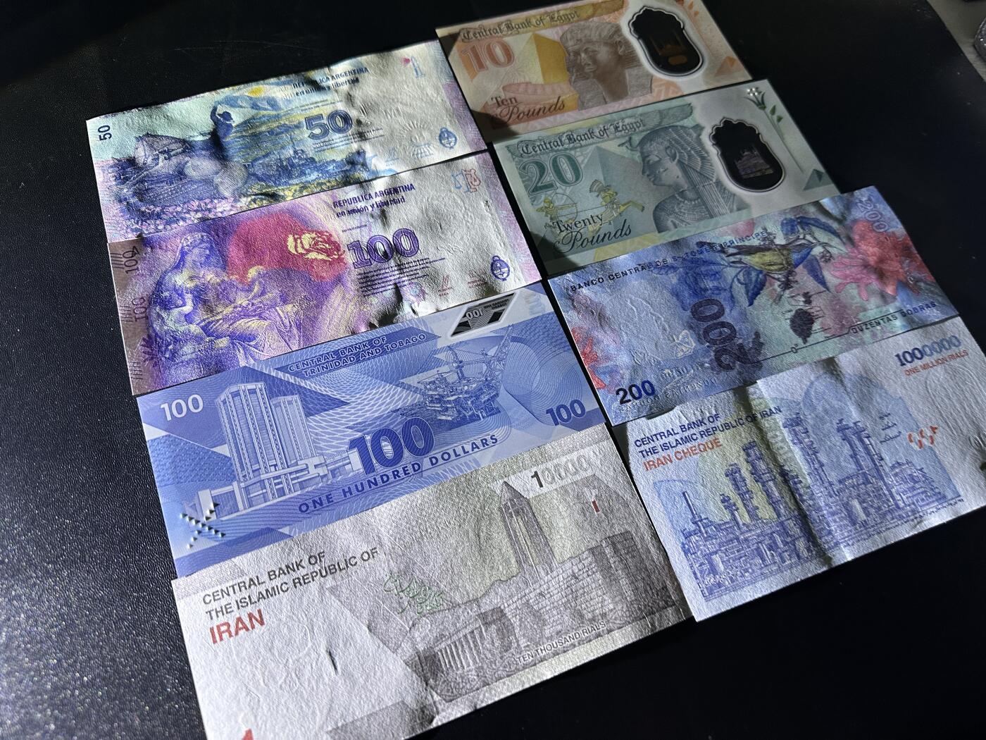 《外钞收藏家》第五百九十七期（年底收官场）（本平台长期征集拍品、欢迎藏友们联系合作） 阿根廷、埃及、特里达尼亚和多巴哥、圣多美和普林西比、伊朗 8张一起 全新UNC