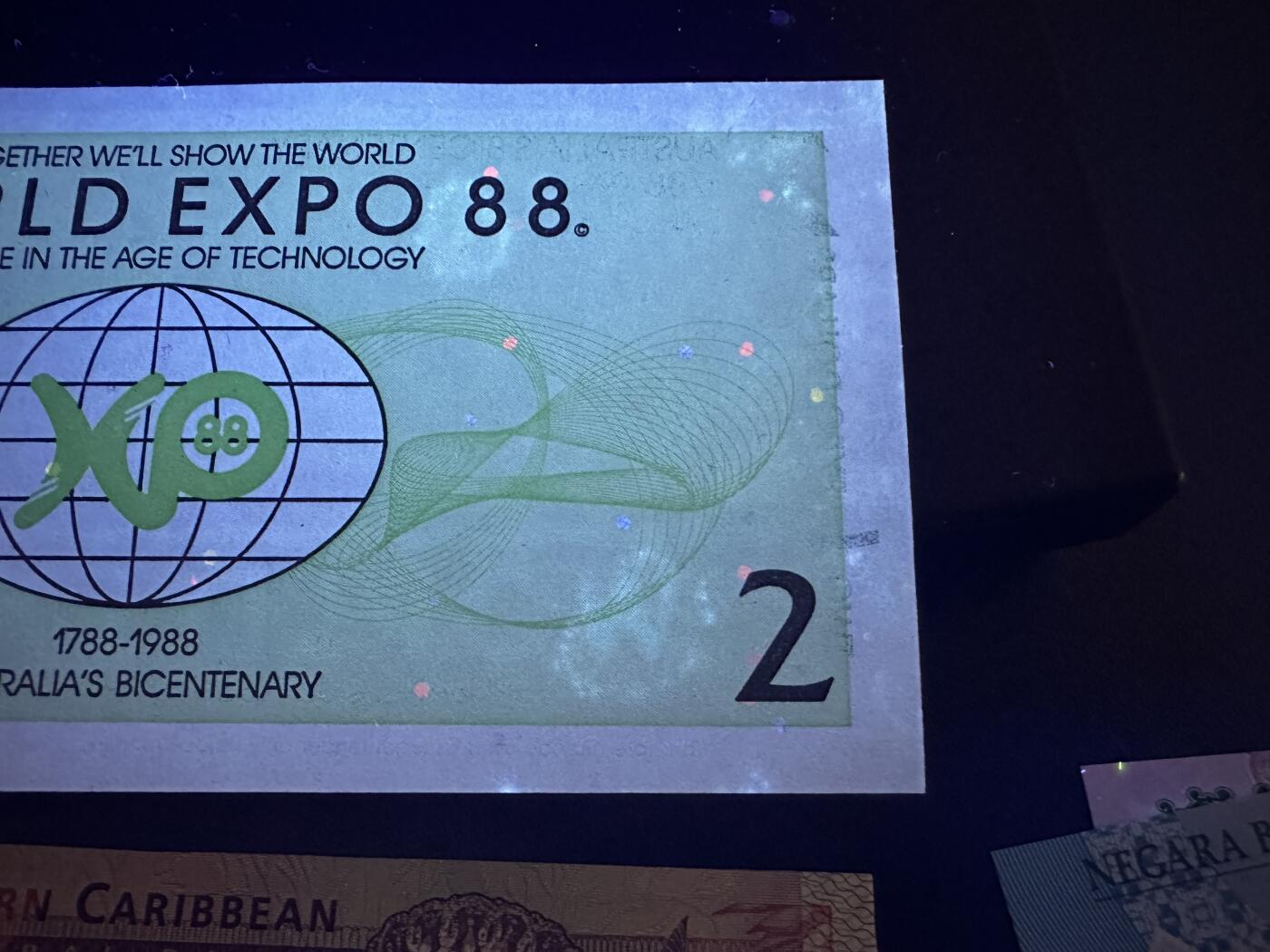 《外钞收藏家》第五百九十七期（年底收官场）（本平台长期征集拍品、欢迎藏友们联系合作） 澳大利亚世博会纪念钞2张（边上轻微潮）+东加勒比纪念钞3张+刚果、几内亚、吉布提、萨摩亚纪念钞共10张一起全新