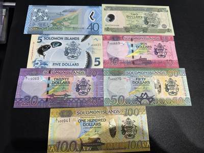 《外钞收藏家》第五百九十七期（年底收官场）（本平台长期征集拍品、欢迎藏友们联系合作） - 索罗门群岛纪念钞2张+5-100面额5张（都是A/1冠）还有两张是百位号 7张一起 全新UNC