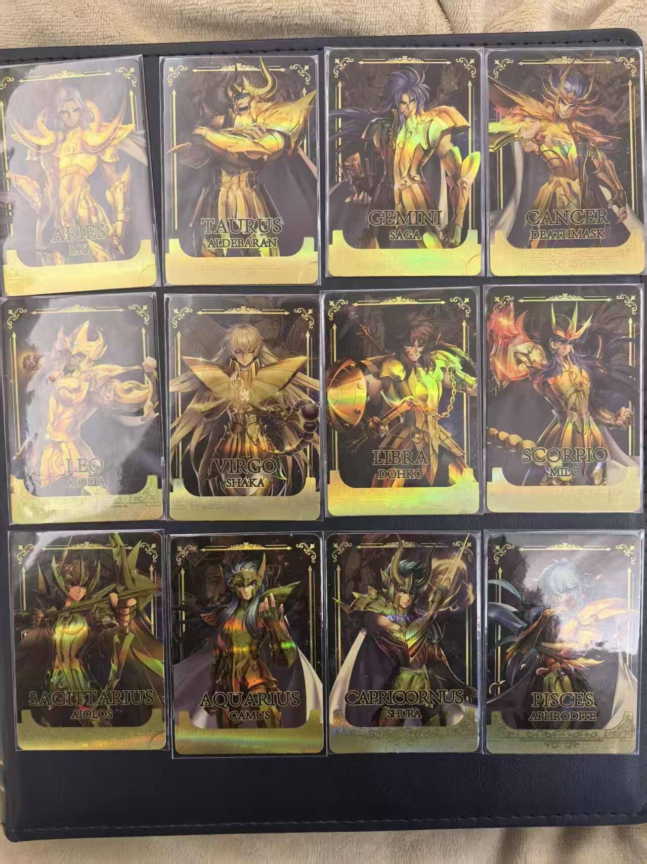 龙虎卡牌-六九场（无佣金，周六结拍，欢迎送拍） 彩闪小卡12张全 圣斗士星矢30周年展览卡 黄金圣斗士一套（卡背圣衣，有压痕，介意勿拍）