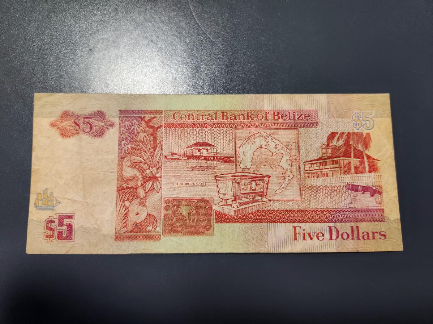 12月27号晚上8点 外国纸币自动截拍第77场 伯利兹1990年5元AA冠 首发 原票