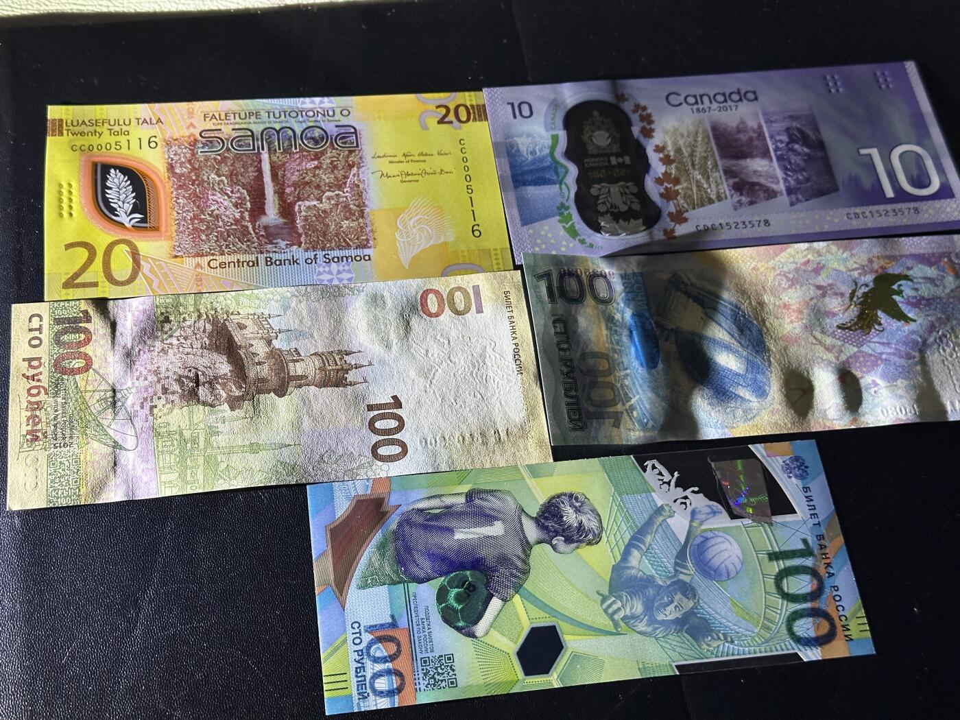《外钞收藏家》第五百九十七期（年底收官场）（本平台长期征集拍品、欢迎藏友们联系合作） 萨摩亚20无47千位号+加拿大10元+三张100卢布 一起 全新UNC