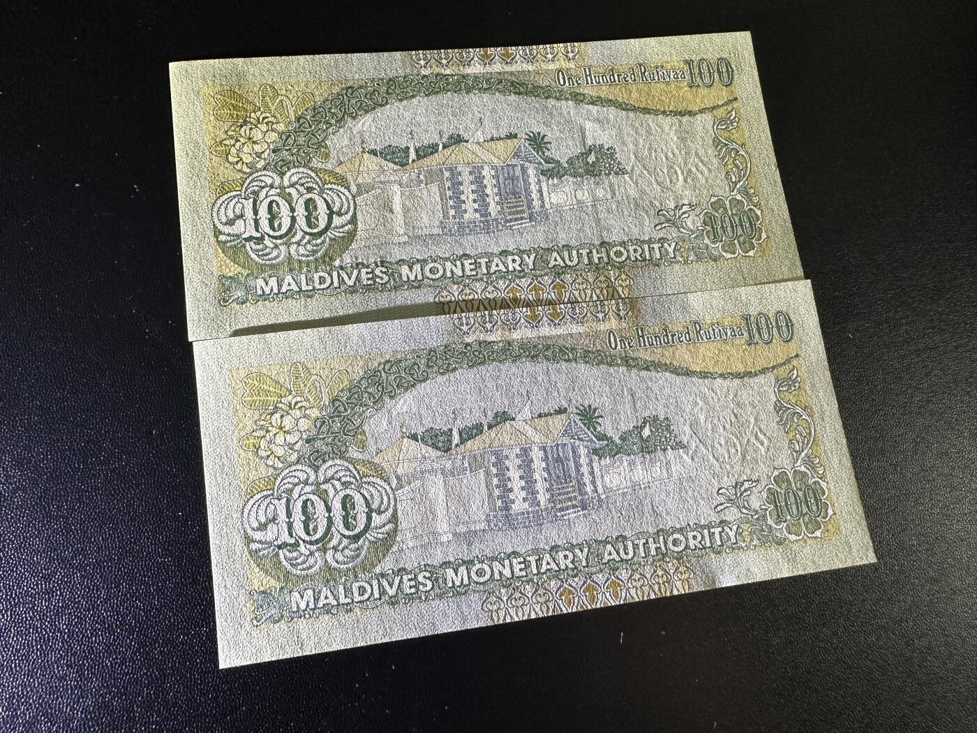 《外钞收藏家》第五百九十七期（年底收官场）（本平台长期征集拍品、欢迎藏友们联系合作） 1995年马尔代夫100 2张一起 全新 有个别不明显荧光点