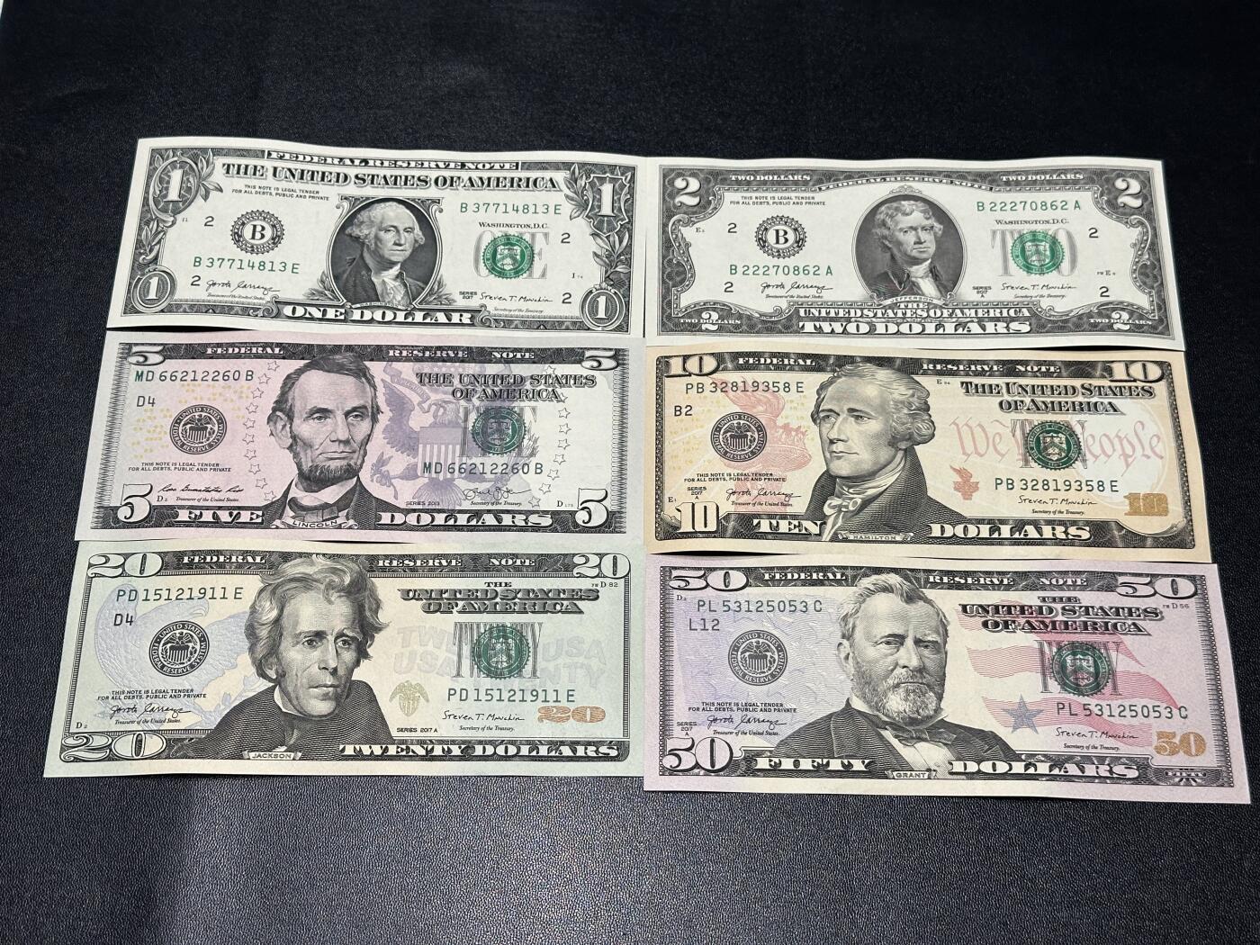 《外钞收藏家》第五百九十七期（年底收官场）（本平台长期征集拍品、欢迎藏友们联系合作） 美国彩版1-50美元 六张一起 全新UNC 除了1和2美元其他都是无47