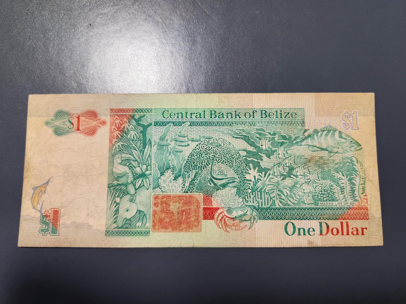 12月27号晚上8点 外国纸币自动截拍第77场 伯利兹1990年1元AA冠 首发 原票