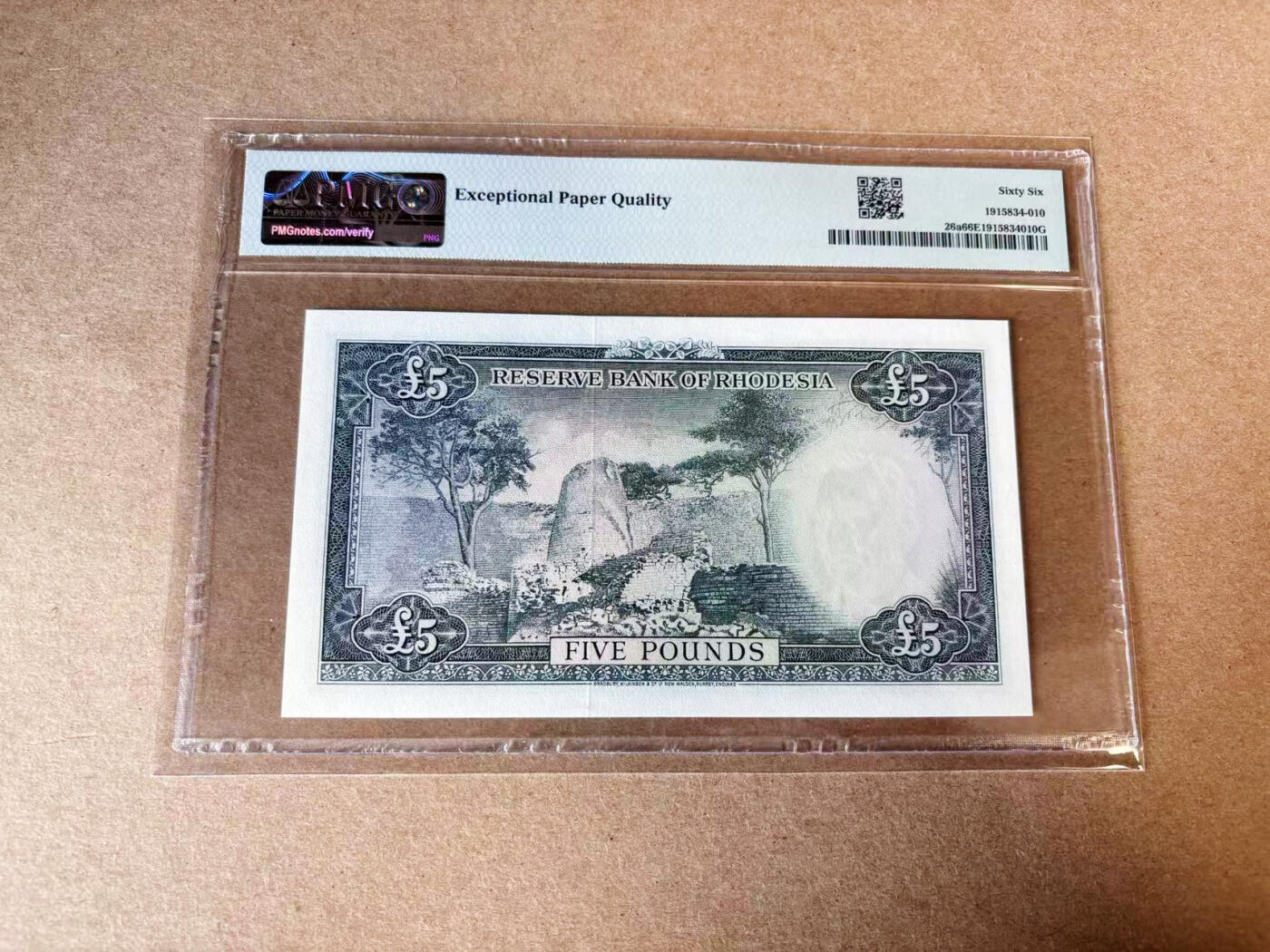【Blue Auction】世界纸币精拍第768期——18级TOP拍卖/信誉/品质/专业/高效💫  【F/1首发】罗德西亚 1964年5镑 戎装女王 大津巴布韦遗址 BWC雕刻精美 PMG66EPQ