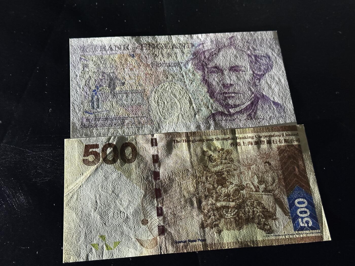 《外钞收藏家》第五百九十七期（年底收官场）（本平台长期征集拍品、欢迎藏友们联系合作） 英国E序列20镑+香港汇丰银行500元 2张一起 非全新 品相如图