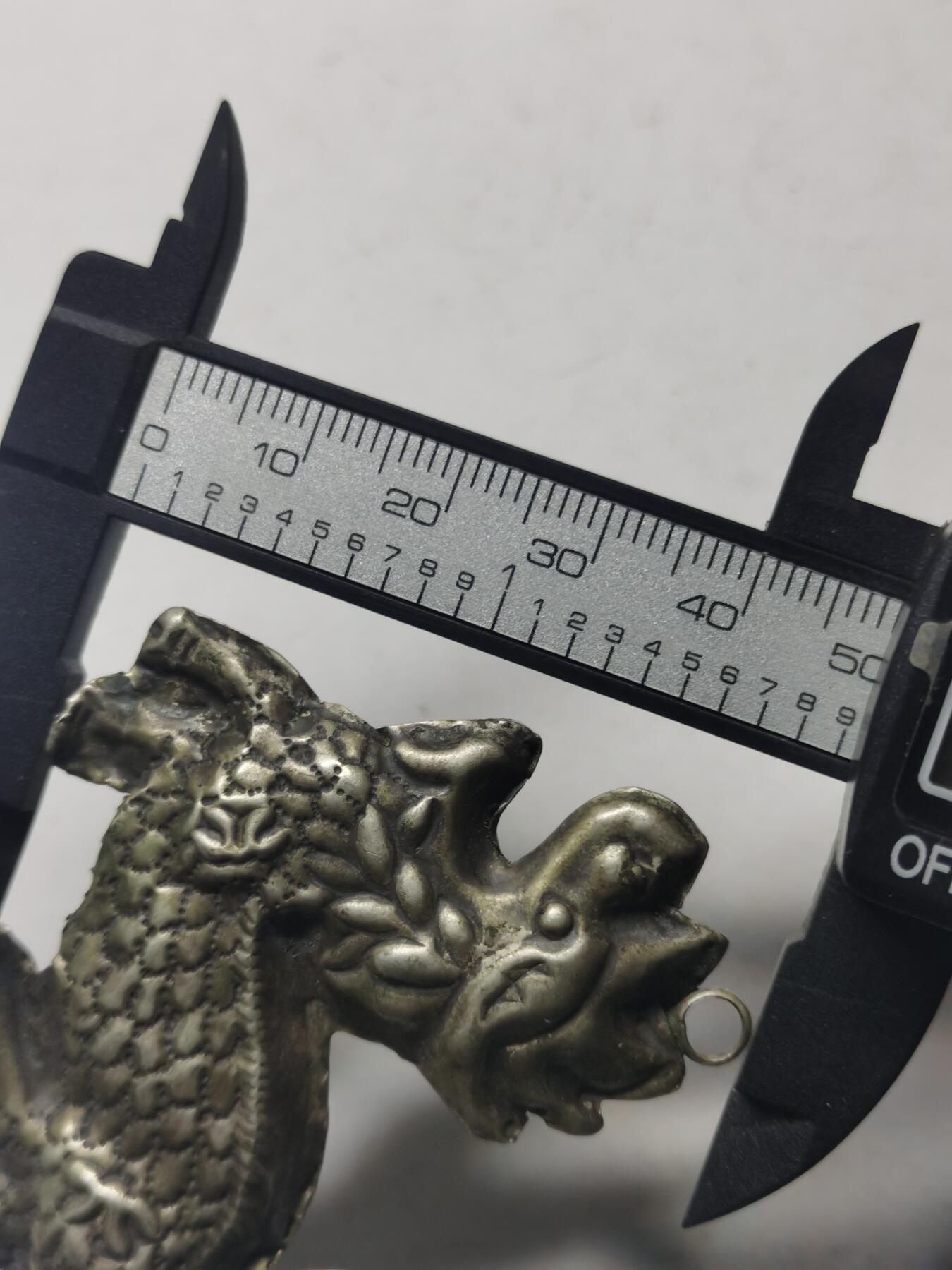 杂件专场90期 清代老银麒麟，双面工